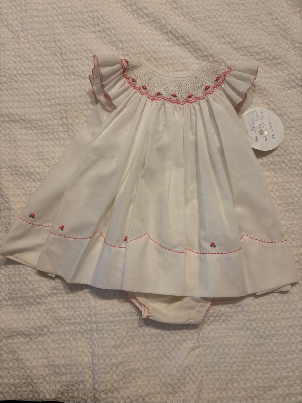 Classic Ivory Baby Dress with Hand-sewn Smocking